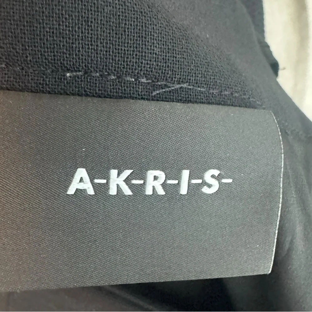 Akris Black Wool  (Lamb Leather lining) Pencil Skirt, Size 8